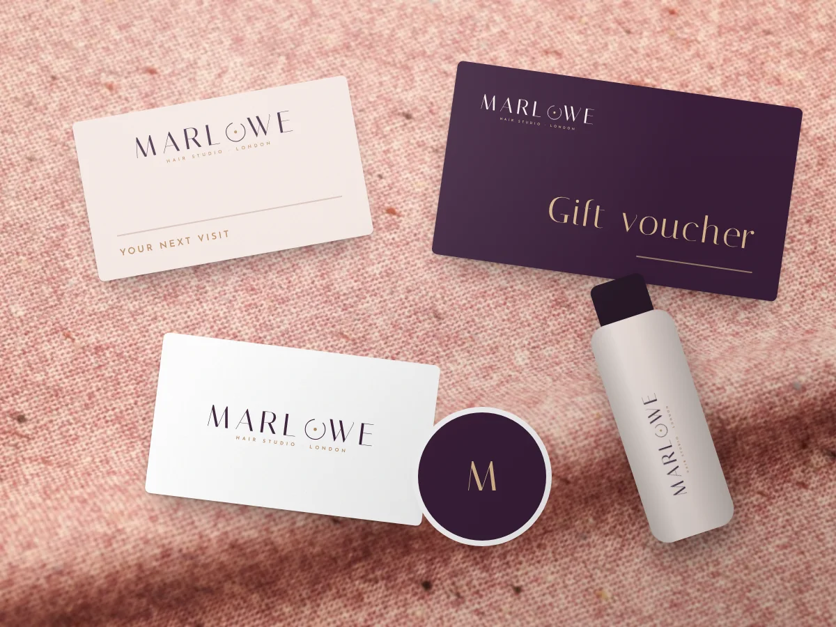 Hair salon branding: appointment cards, a gift voucher, a product bottle and a sticker, by Buy Dream Web in London